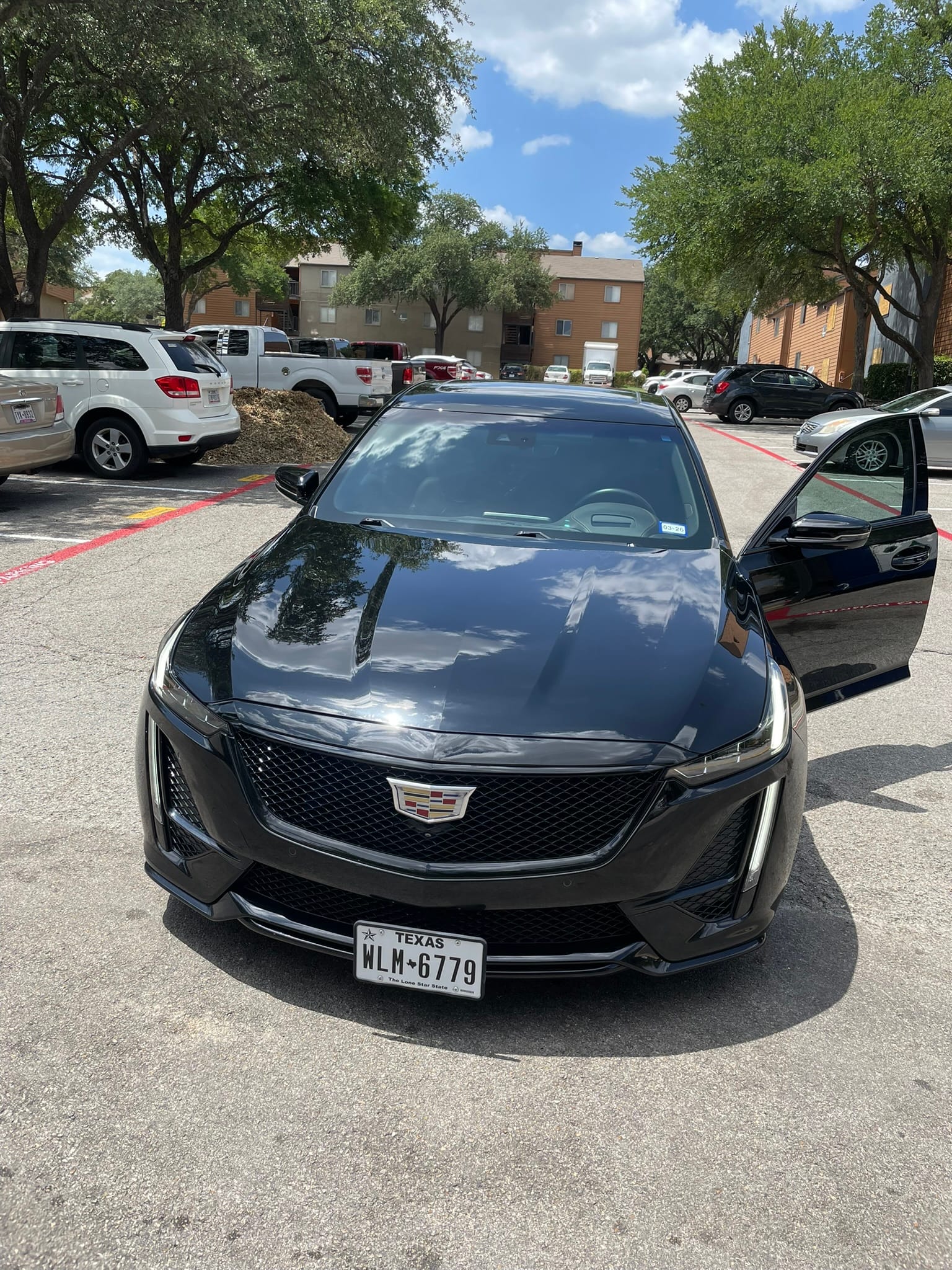 Exterior hand wash on black Cadillac CT5-V Dallas TX