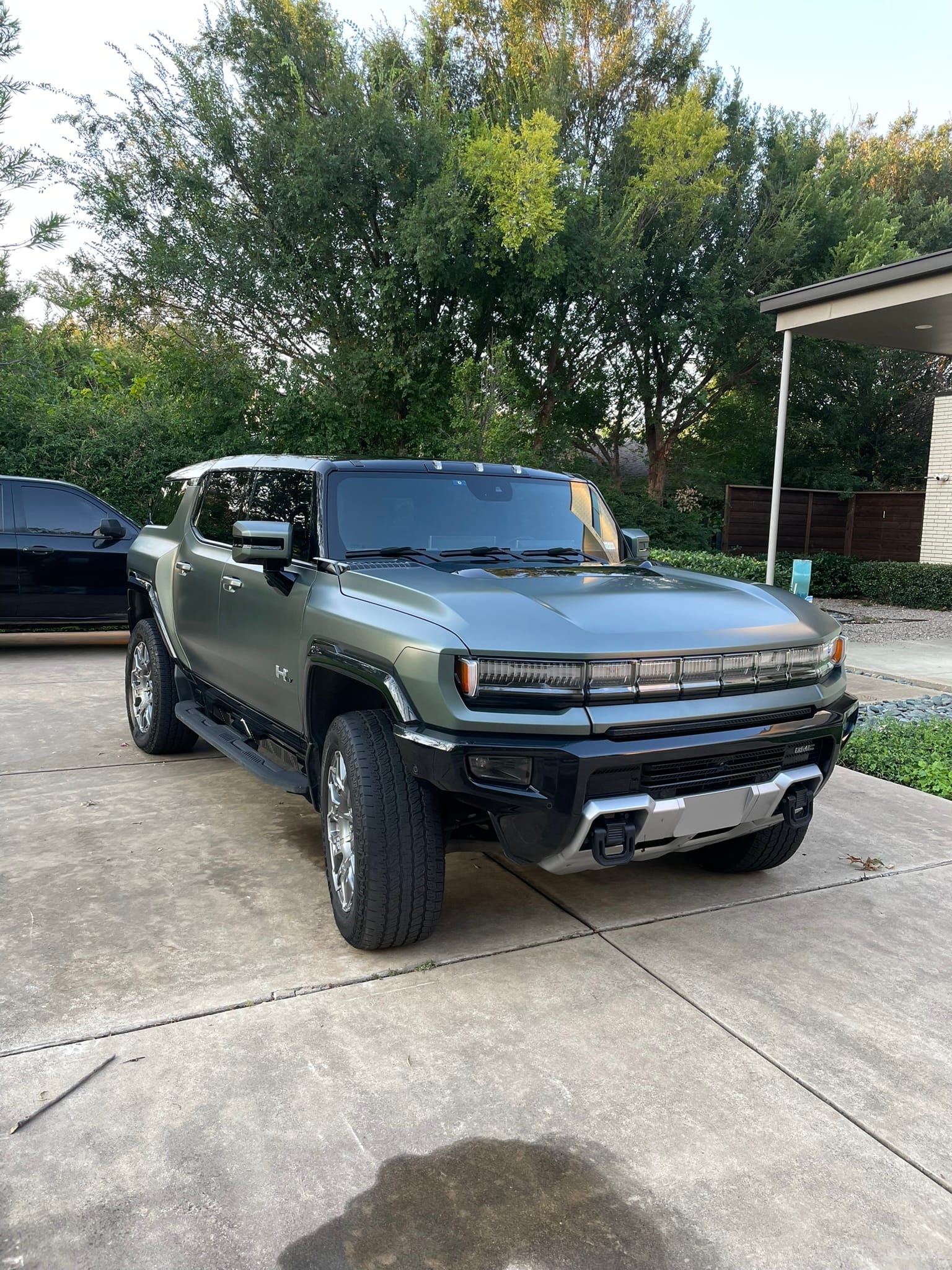 Exterior detailing result showing mirror-like finish on Hummer EV Dallas